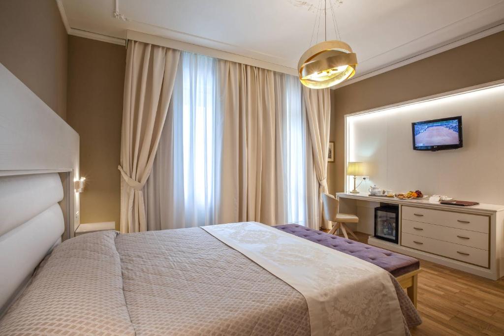 Двухместный (Улучшенный двухместный номер с 1 кроватью или 2 отдельными кроватями) отеля Hotel Quisisana Terme, Абано-Терме