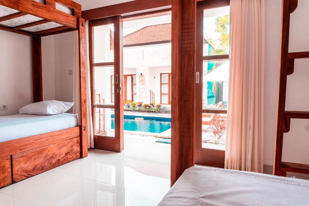 Номер (Кровать в общем 4-местном номере для мужчин и женщин) гостевого дома Bali Beats Guesthouse Uluwatu, Улувату