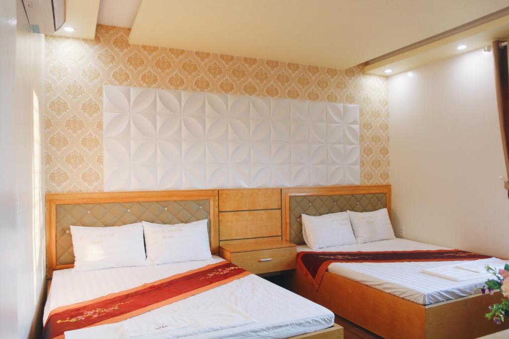 Двухместный (Двухместный номер с 1 кроватью или 2 отдельными кроватями и собственной ванной комнатой) мотеля Xuan Thanh Hotel, Тхань Хоа