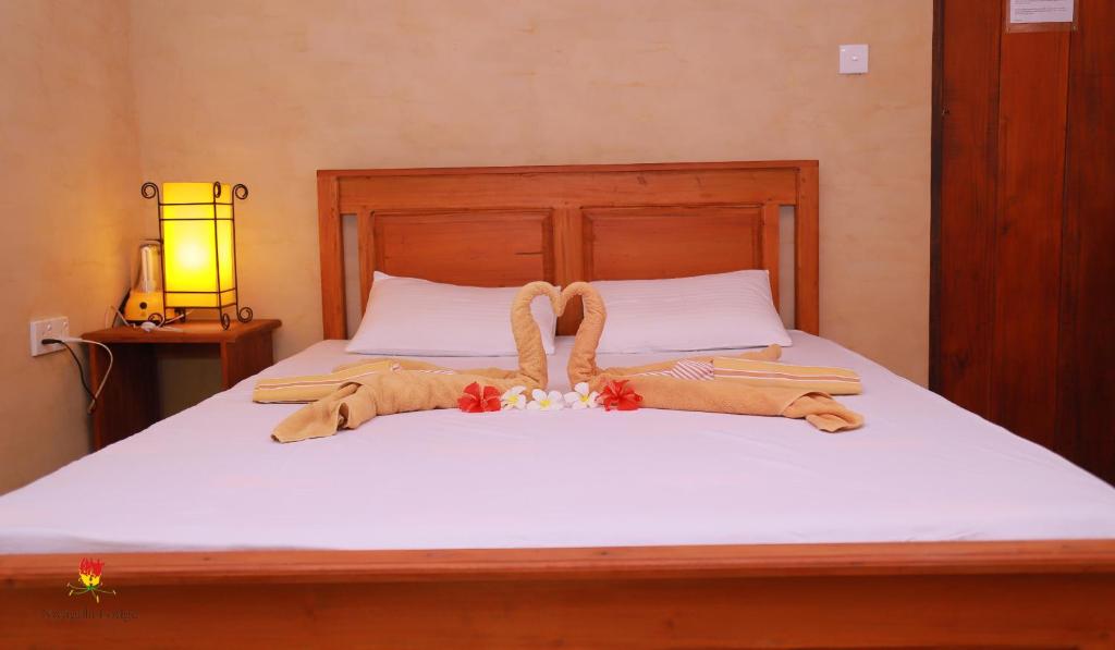 Двухместный (Двухместный номер с 1 кроватью и собственной ванной комнатой вне номера) отеля Niyagala Lodge Sigiriya, Сигирия