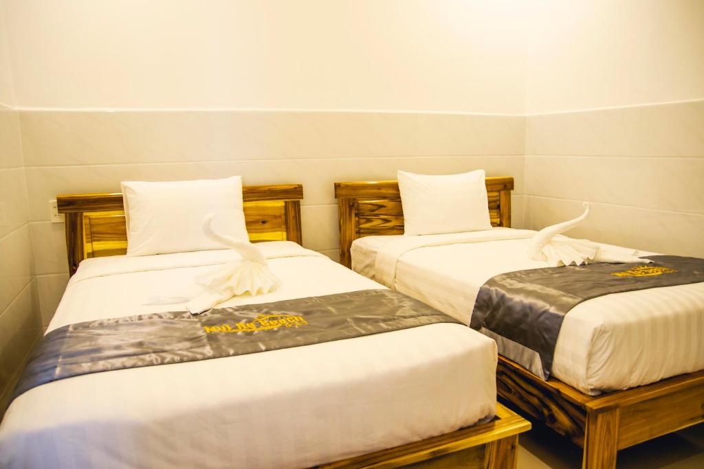 Двухместный (Улучшенный двухместный номер с 2 отдельными кроватями) отеля Mui Ne Beach Hotel, Фантхьет
