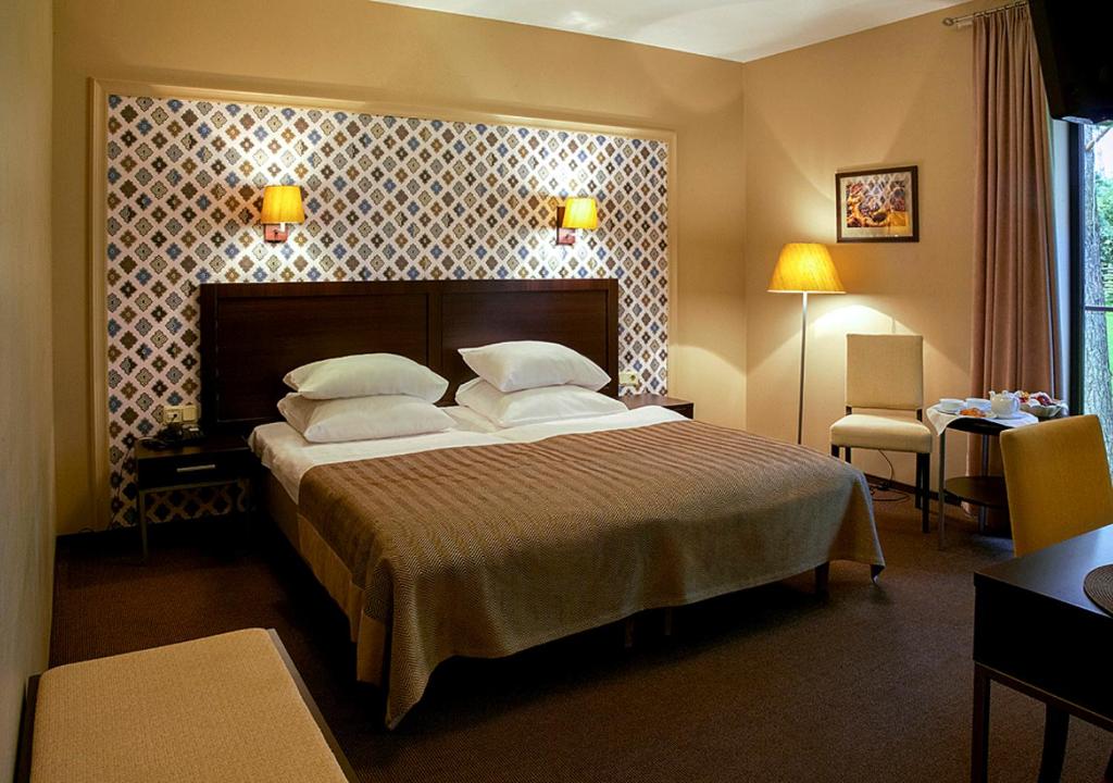 Двухместный (Стандартный двухместный номер с 1 кроватью или 2 отдельными кроватями и доступом в спа-центр) отеля Margis, Тракай