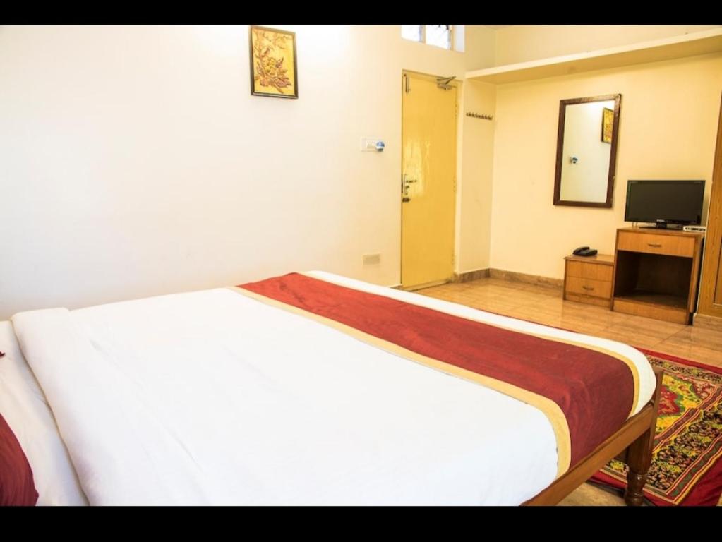 Двухместный (Двухместный номер Делюкс с 1 кроватью и балконом) гостевого дома Nachis BNB, Бангалор
