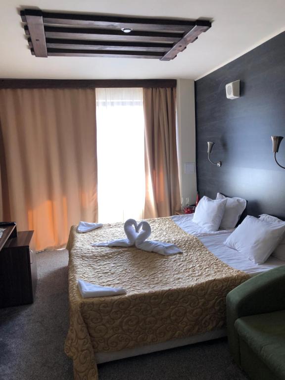 Двухместный (Двухместный номер с 2 отдельными кроватями) отеля Flora Hotel, Боровец