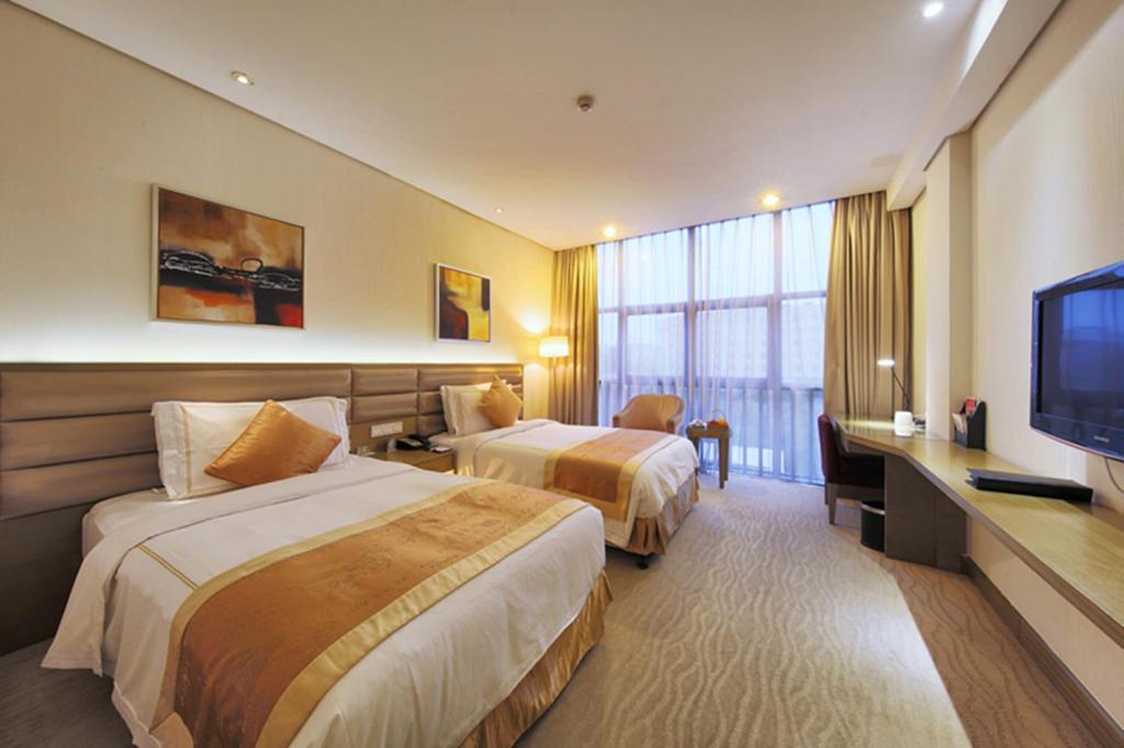 Двухместный (Двухместный номер с 2 отдельными кроватями - Для некурящих) отеля Ramada Plaza Shanghai Caohejing Hotel, Шанхай