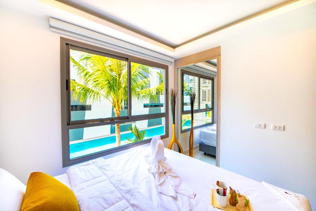 Апартаменты (Люкс с видом на бассейн) апартамента Arcadia Beach Resort Pattaya, Паттайя