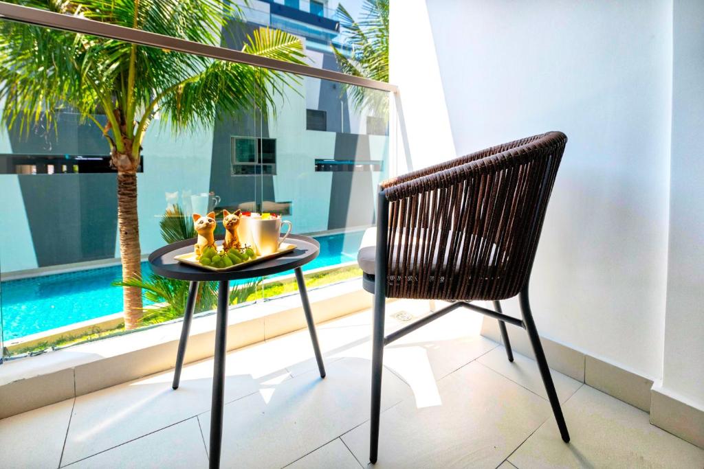 Апартаменты (Эксклюзивный люкс - Вид на бассейн) апартамента Arcadia Beach Resort Pattaya, Паттайя