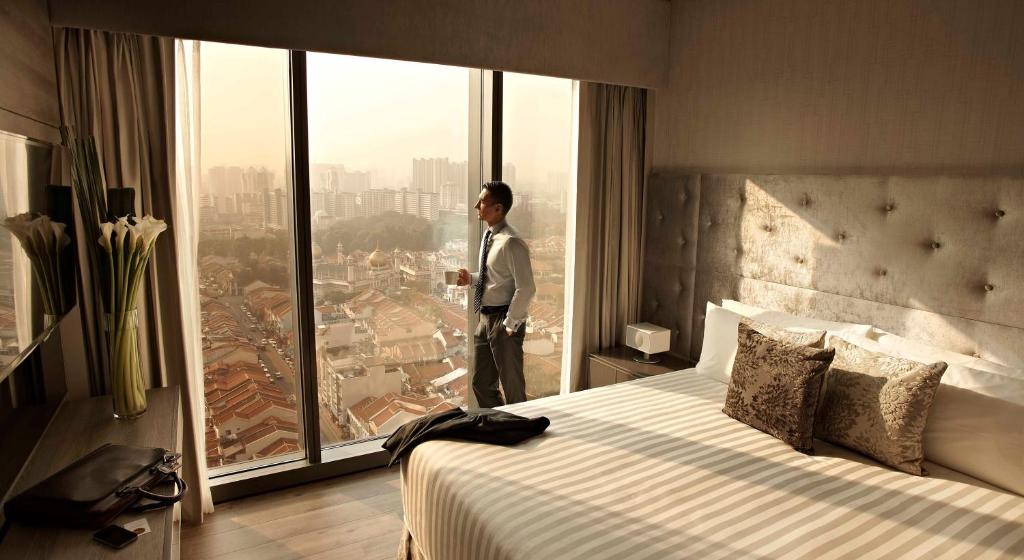 Апартаменты (Предложение «Отпуск дома» - Представительские апартаменты с 1 спальней) апарт-отеля Pan Pacific Serviced Suites Beach Road, Сингапур (город)