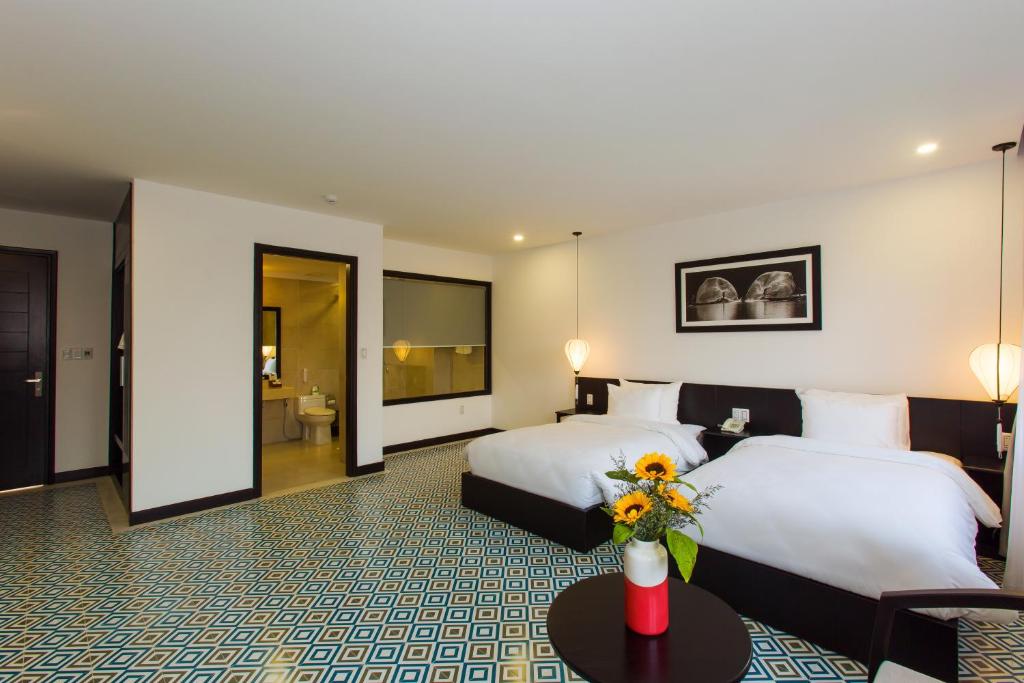 Двухместный (Двухместный номер Делюкс с 1 кроватью или 2 отдельными кроватями с окном) курортного отеля Hoi An Waterway Resort, Хойан