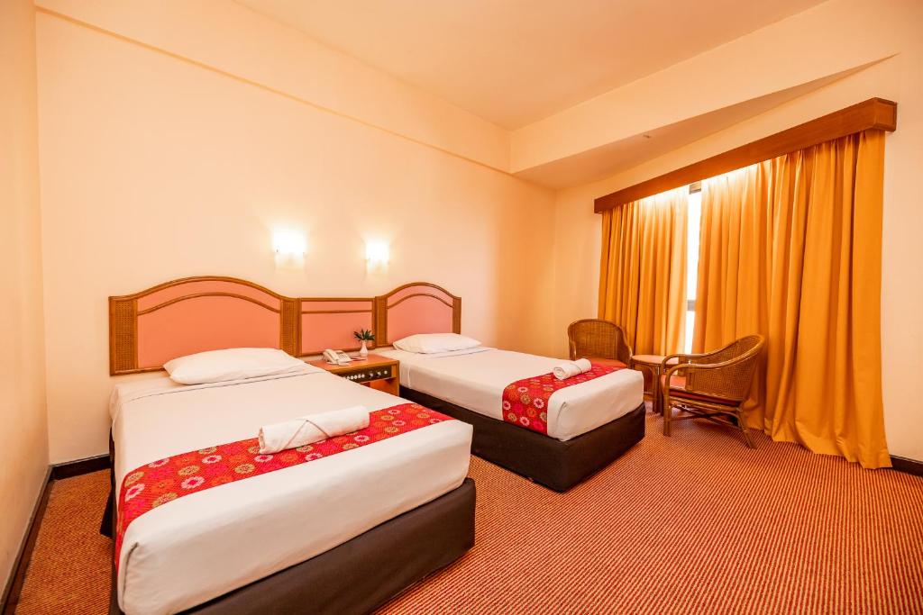 Двухместный (Двухместный номер Делюкс с 2 отдельными кроватями) отеля Hotel Grand Continental Langkawi, Лангкави