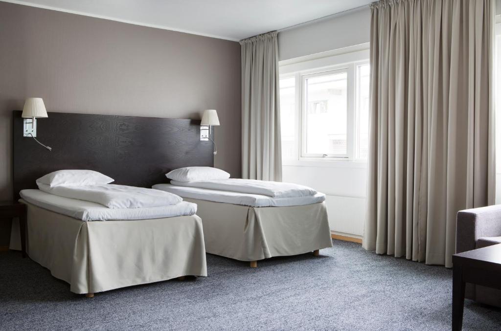 Двухместный (Двухместный номер Делюкс с 2 отдельными кроватями) отеля Comfort Hotel Florø, Флоро