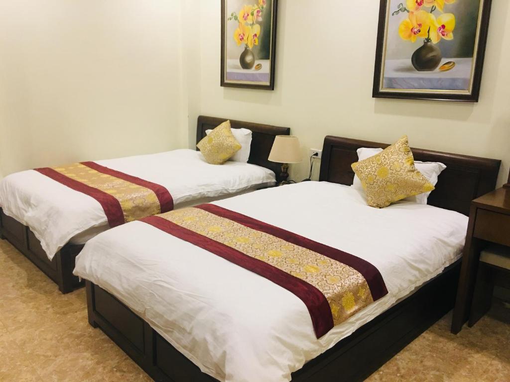 Двухместный (Улучшенный двухместный номер с 2 отдельными кроватями) отеля Hoang Ngoc Hotel, Донг Ван