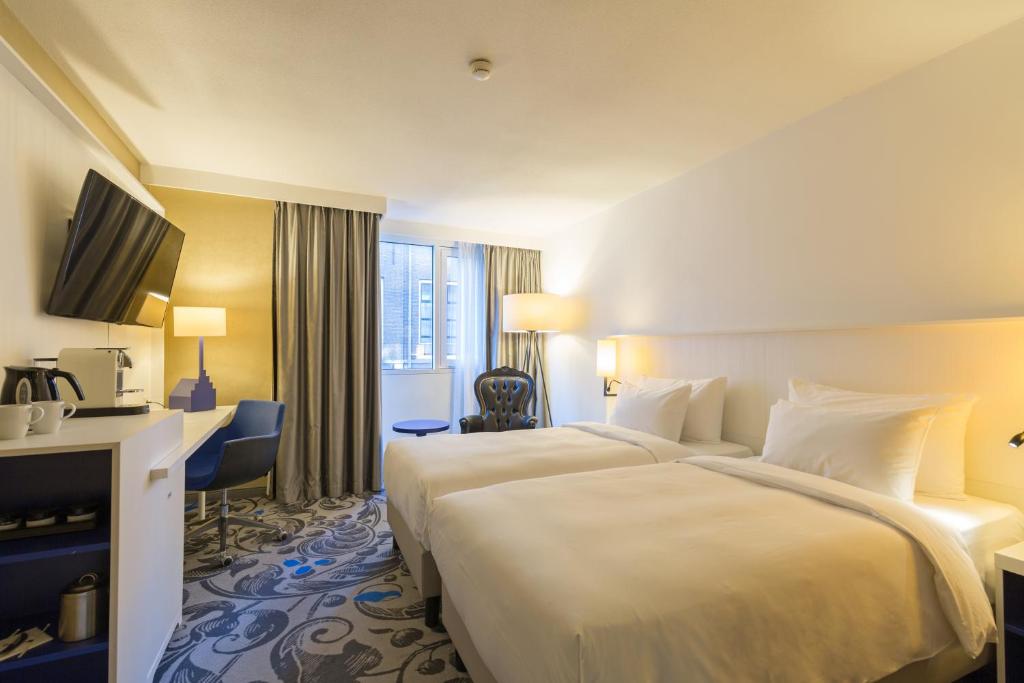 Двухместный (Улучшенный двухместный номер с 1 кроватью или 2 отдельными кроватями) отеля Radisson Blu Hotel, Amsterdam, Амстердам