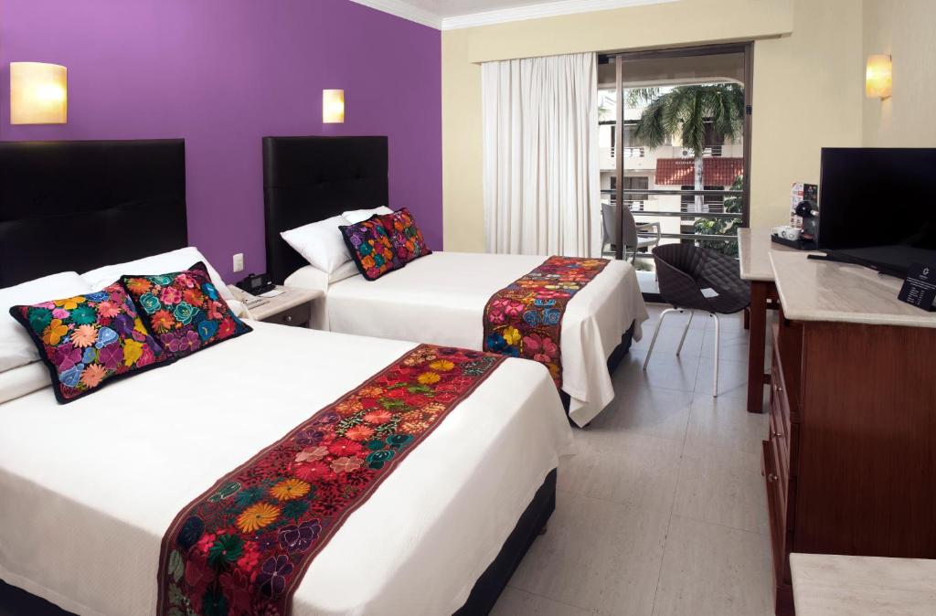 Двухместный (Двухместный номер с 2 двуспальными кроватями) отеля Adhara Hacienda Cancun, Канкун