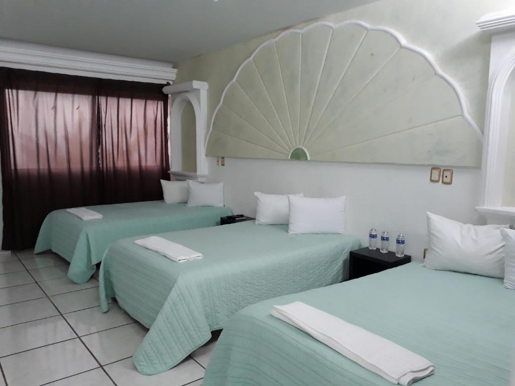 Трехместный (Стандартный трехместный номер) отеля Di-an, Бока-дель-Рио