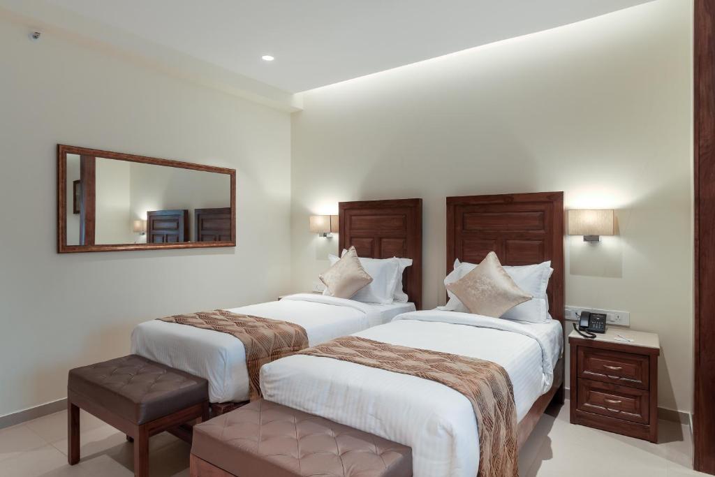 Сьюит (Полулюкс с 2 односпальными кроватями) курортного отеля Seashell Villas The Villa Resort, Кандолим