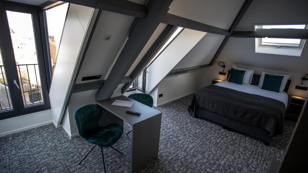 Двухместный (Улучшенный двухместный номер Делюкс с 1 кроватью) отеля Hotel De Nieuwe Doelen, Мидделбург