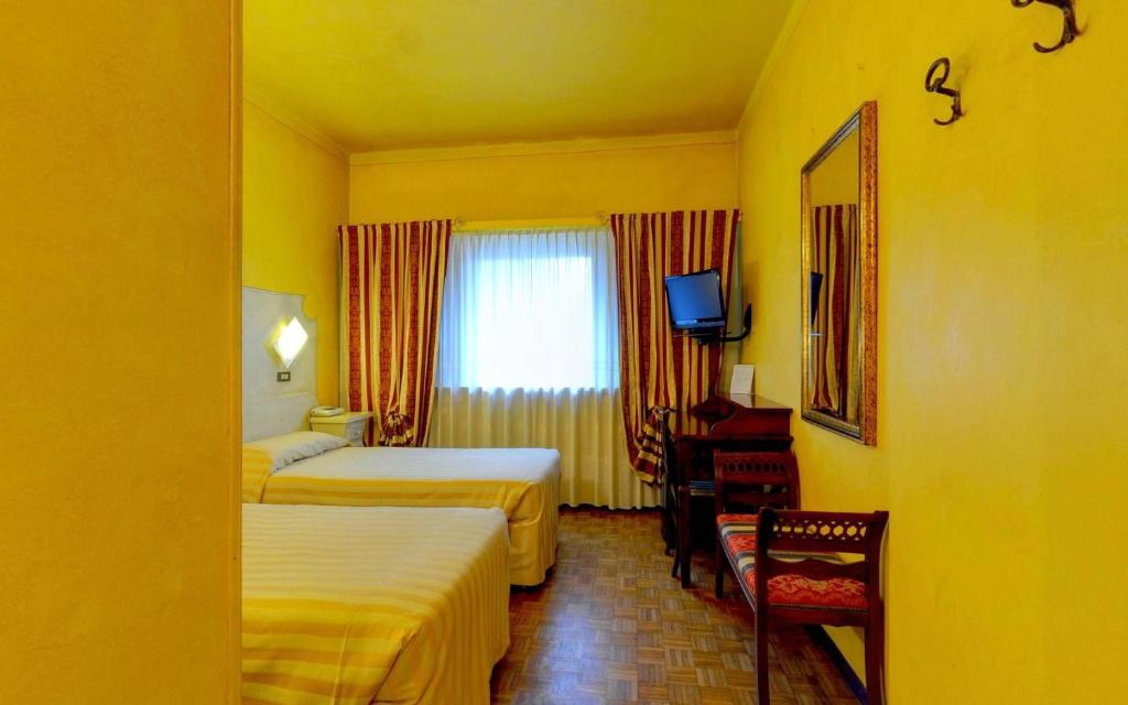 Двухместный (Двухместный номер с 2 отдельными кроватями) отеля Ai Ronchi Motor Hotel, Брешиа