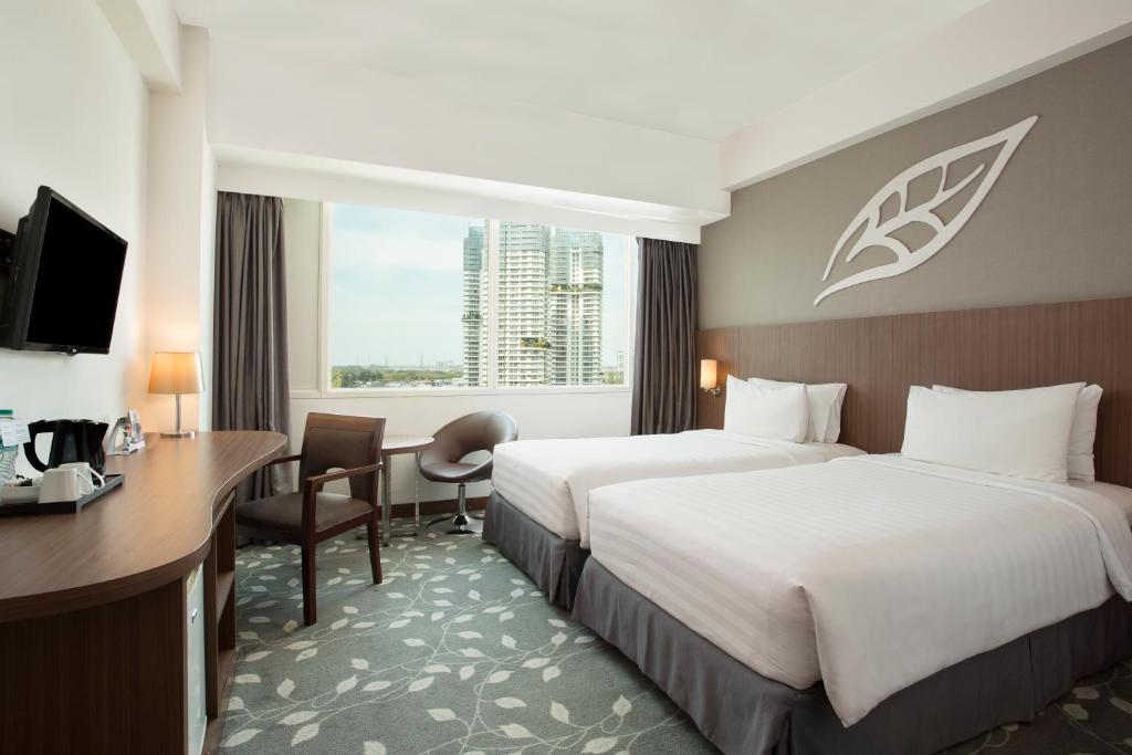 Двухместный (Улучшенный двухместный номер Делюкс с 2 отдельными кроватями) отеля Swiss-Belinn Kemayoran, Джакарта