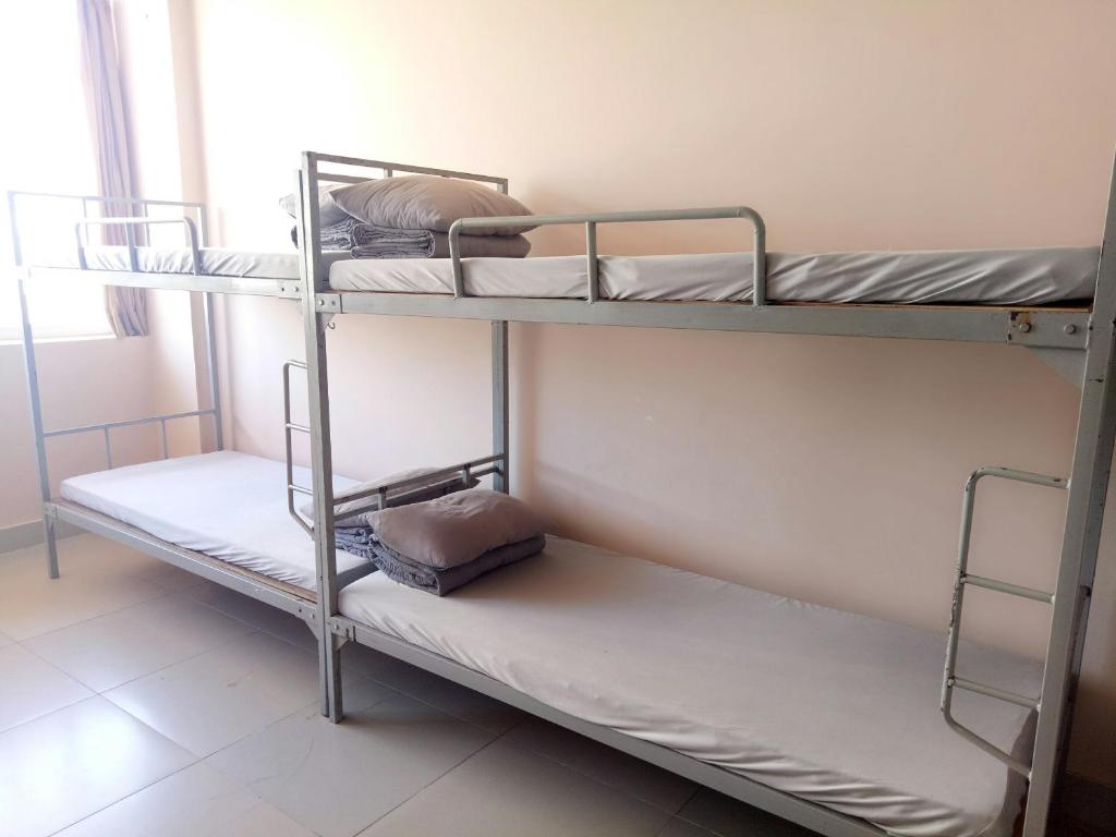 Номер (Спальное место на двухъярусной кровати в общем номере для мужчин и женщин) гостевого дома Thanh Nien Guesthouse - Vung Tau, Вунгтау
