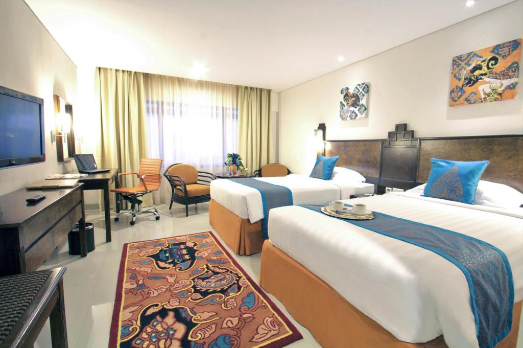 Двухместный (Двухместный номер Делюкс с 2 отдельными кроватями) отеля Grand Sahid Jaya CBD, Джакарта