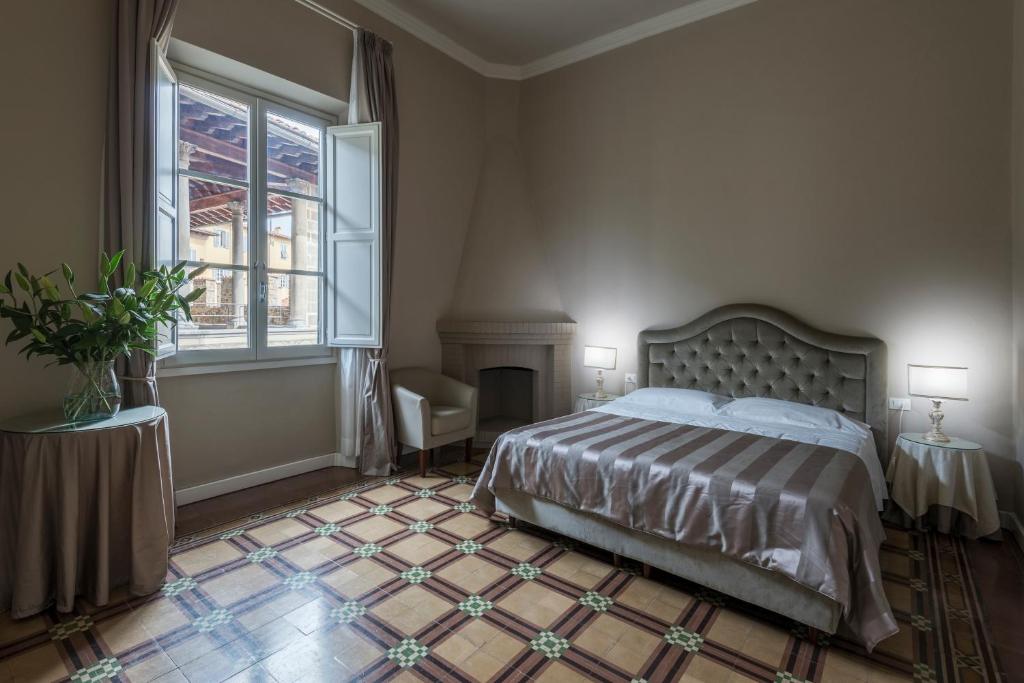 Двухместный (Просторный улучшенный двухместный номер с 1 кроватью или 2 отдельными кроватями — Дополнительное здание) отеля Hotel Torre Guelfa Palazzo Acciaiuoli, Флоренция