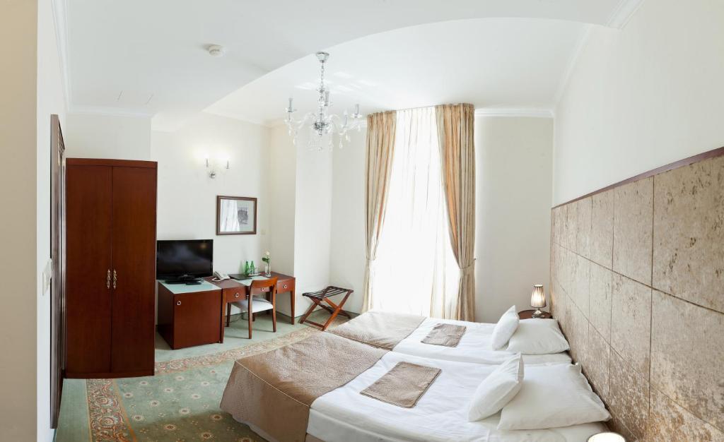 Двухместный (Двухместный номер с 1 кроватью или 2 отдельными кроватями) отеля Hotel Willa Hueta, Кельце