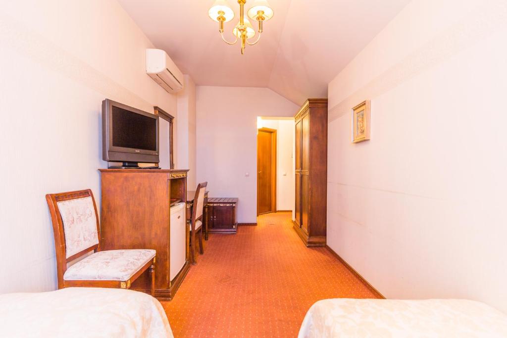 Двухместный (Двухместный номер с 2 отдельными кроватями) отеля Hotel Garden Palace, Рига