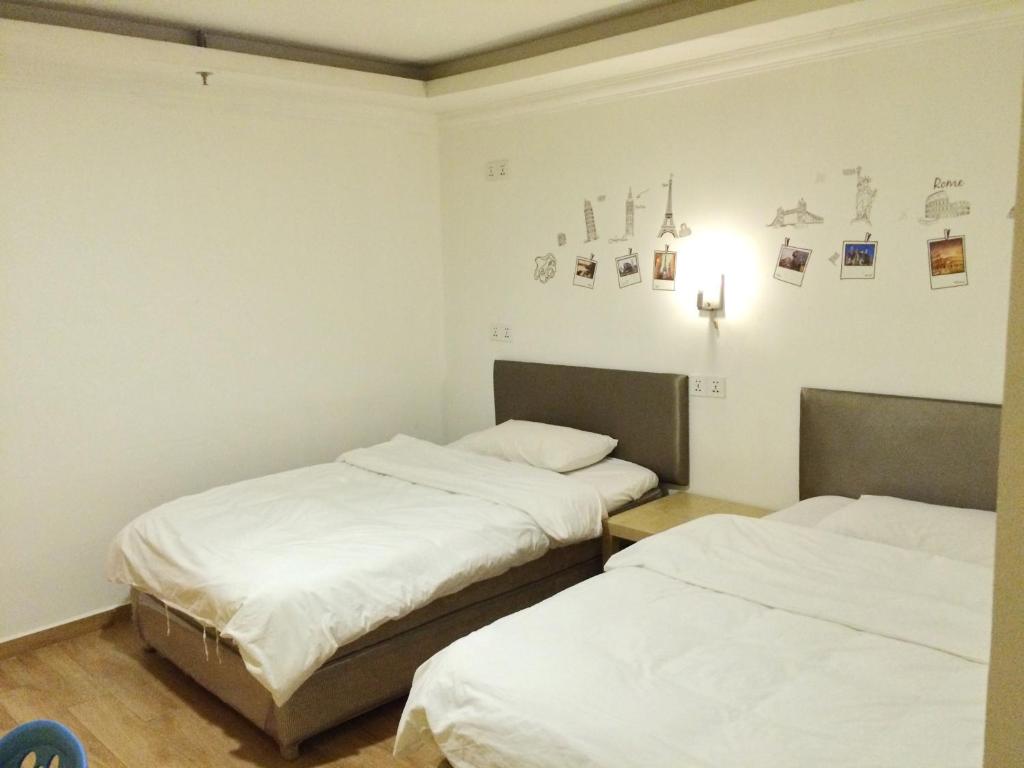 Двухместный (Стандартный двухместный номер с 2 отдельными кроватями и собственной ванной комнатой) хостела Lazy Gaga Hostel Guangzhou, Гуанчжоу