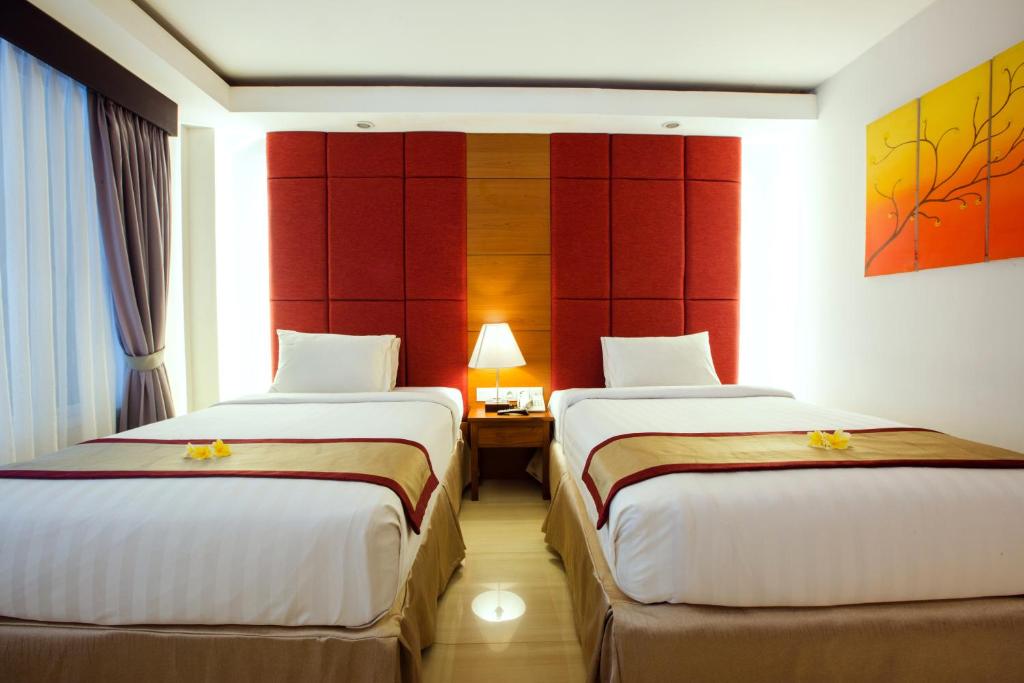 Двухместный (Лучшее специальное предложение - Двухместный номер Делюкс с 2 отдельными кроватями) курортного отеля Royal Singosari Kuta, Кута