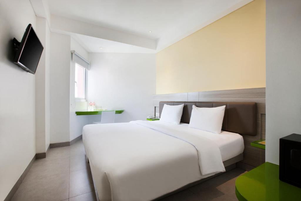 Двухместный (Элегантный номер с кроватью размера «queen-size») отеля Amaris Hotel Mangga Besar, Джакарта