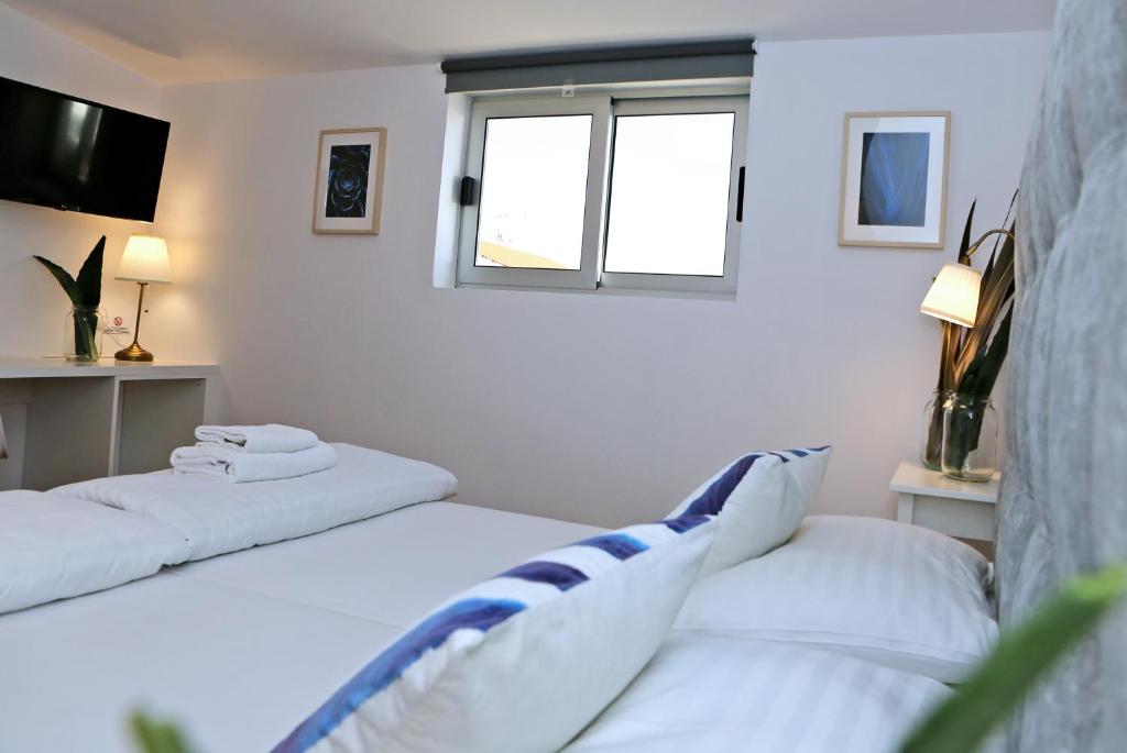Двухместный (Бюджетный двухместный номер с 1 кроватью или 2 отдельными кроватями, без балкона) отеля Hotel Delfin, Задар