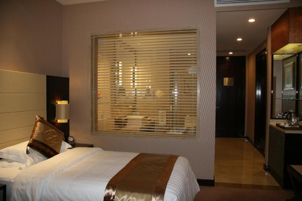 Двухместный (Двухместный номер Делюкс с 2 отдельными кроватями) отеля Ritan Hotel Downtown Beijing, Пекин