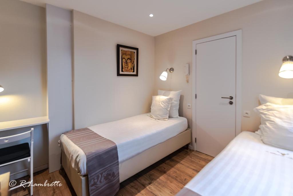 Двухместный (Небольшой двухместный номер с 2 отдельными кроватями) отеля Hotel Des Ardennes, Вервье