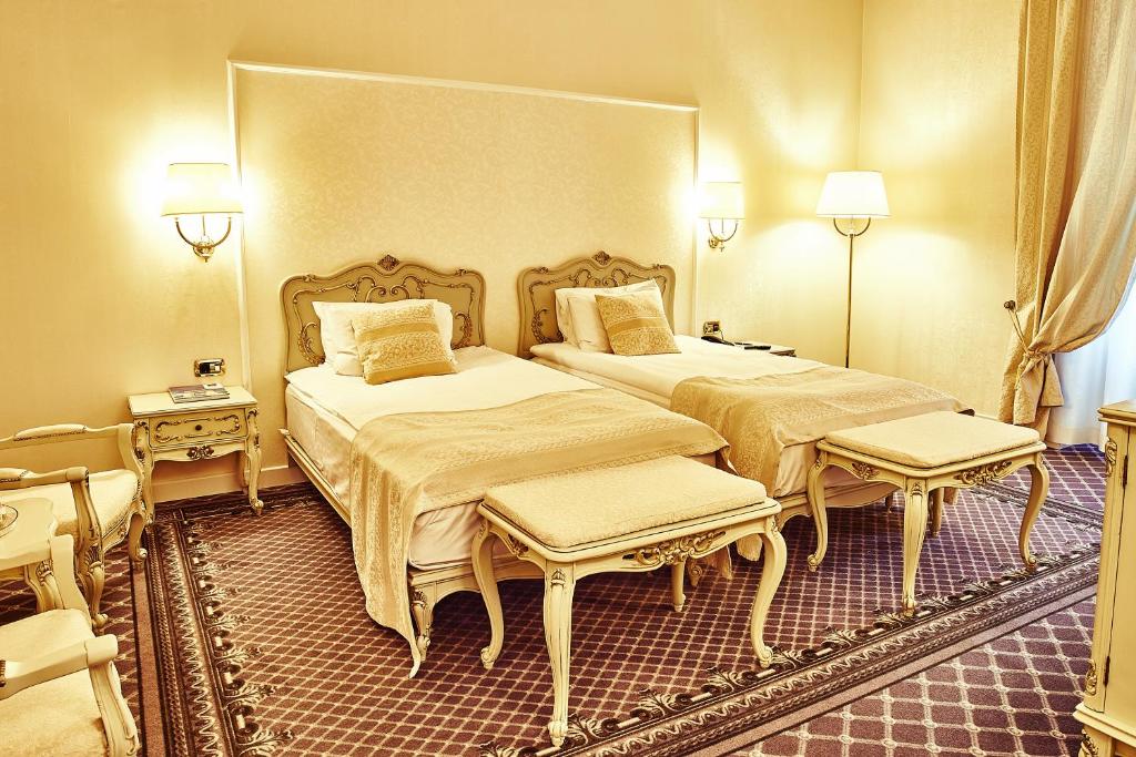 Двухместный (Улучшенный двухместный номер с 2 отдельными кроватями) отеля Grand Hotel Continental, Бухарест
