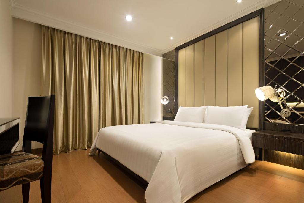 Двухместный (Представительский двухместный номер с 1 кроватью или 2 отдельными кроватями) отеля Golden Boutique Hotel Kemayoran, Джакарта