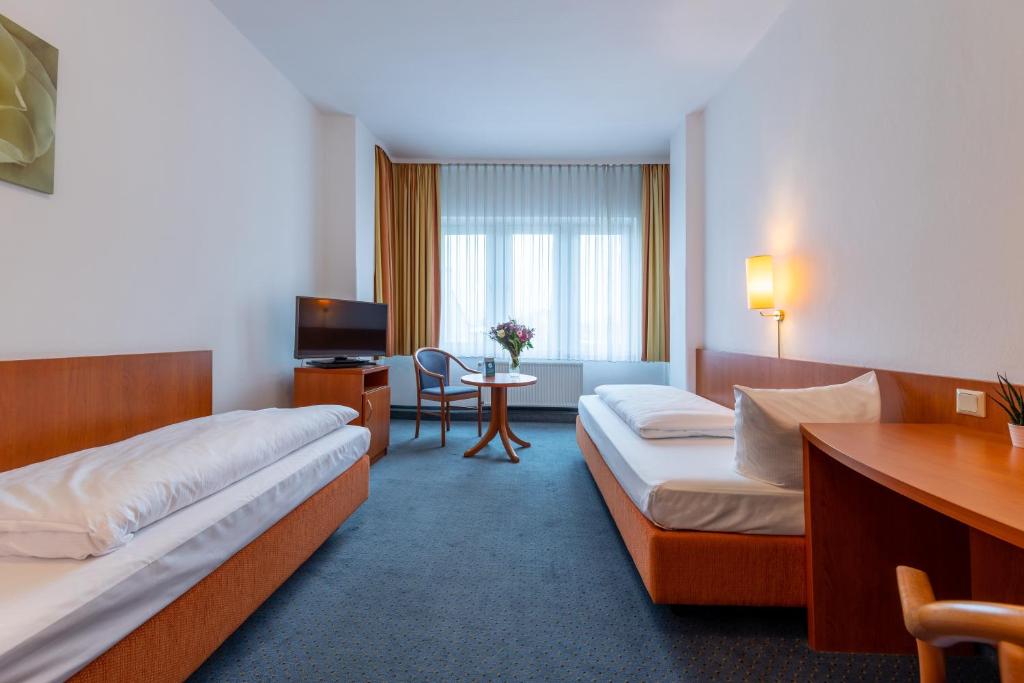 Двухместный (Двухместный номер с 2 отдельными кроватями) отеля Centro Hotel Schumann, Дюссельдорф