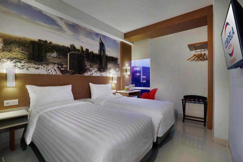 Двухместный (Двухместный номер Делюкс с 2 отдельными кроватями) отеля Cordela Senen Jakarta, Джакарта