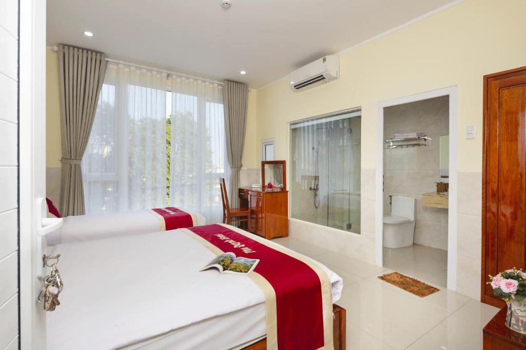 Двухместный (Двухместный номер Делюкс с 2 двуспальными кроватями) отеля Phu Quynh Hotel, Фанранг