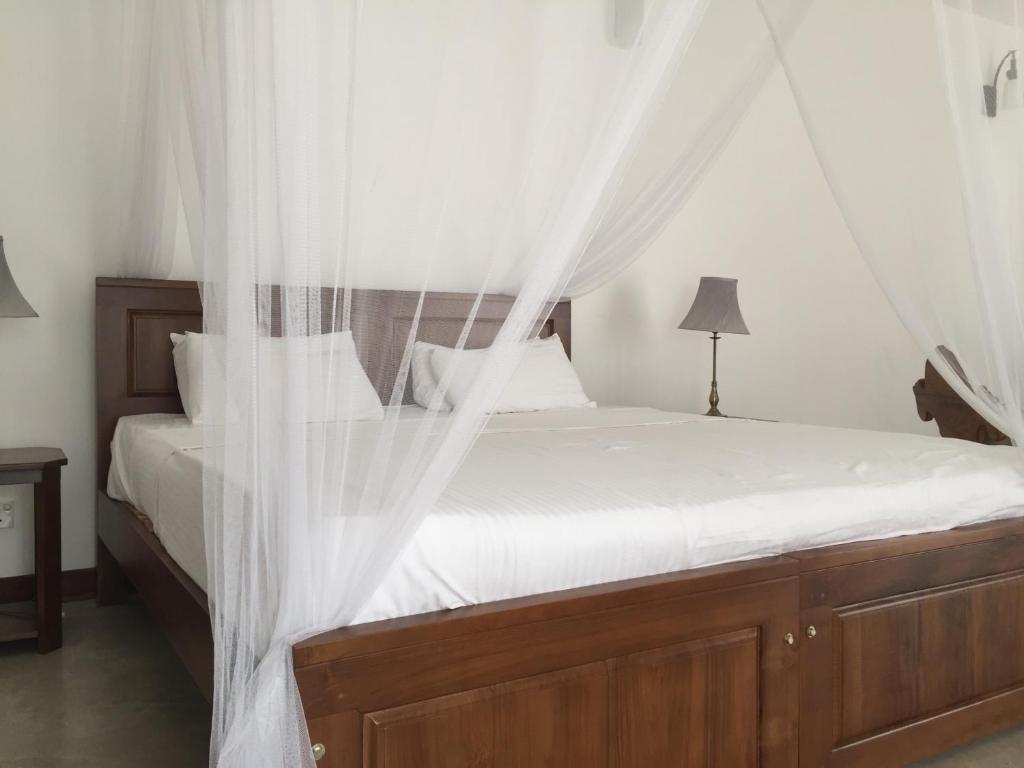 Трехместный (Улучшенный трехместный номер) отеля Villa Nilmalee, Гампола