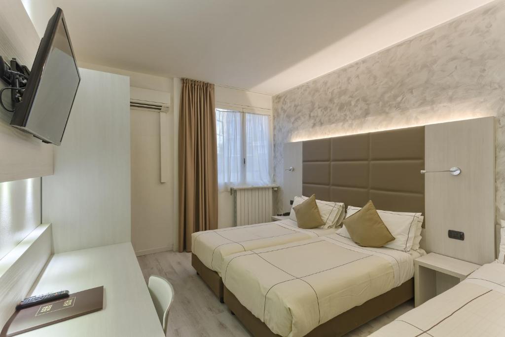 Двухместный (Улучшенный двухместный номер с 1 кроватью или 2 отдельными кроватями) отеля Agape Hotel, Милан