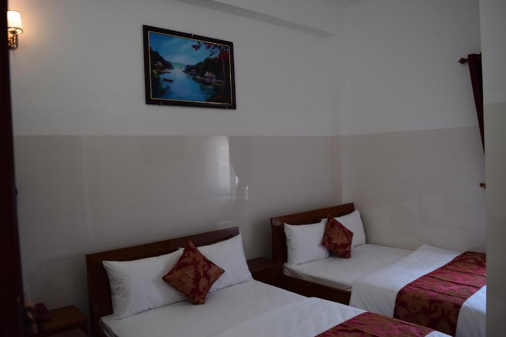 Двухместный (Двухместный номер с 2 отдельными кроватями) отеля KHÁCH SẠN MỸ NGỌC, Буонметхуот