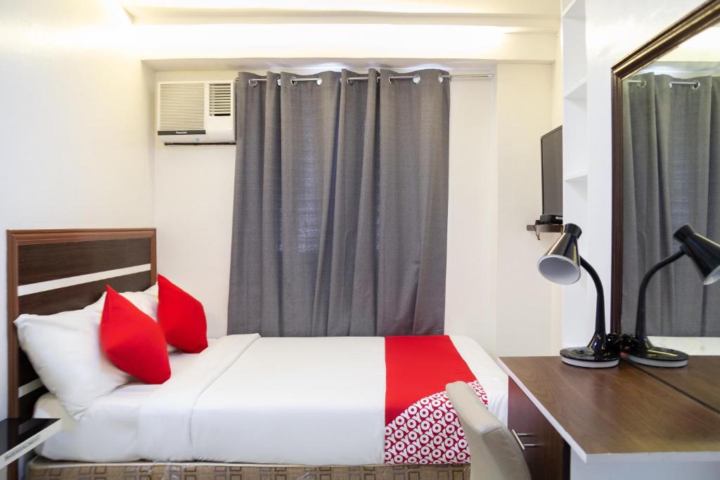 Двухместный (Стандартный двухместный номер с 1 кроватью) отеля OYO 165 Circle-B Apartelle & Suites, Давао