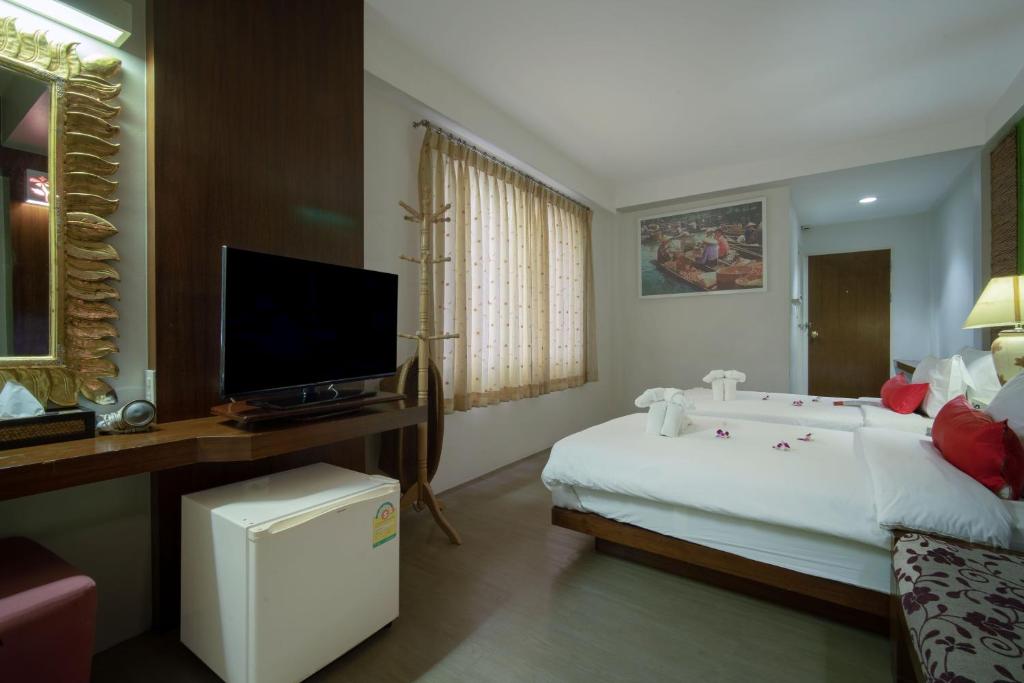 Двухместный (Двухместный номер Делюкс с 2 отдельными кроватями) отеля Villa Cha-Cha, Бангкок