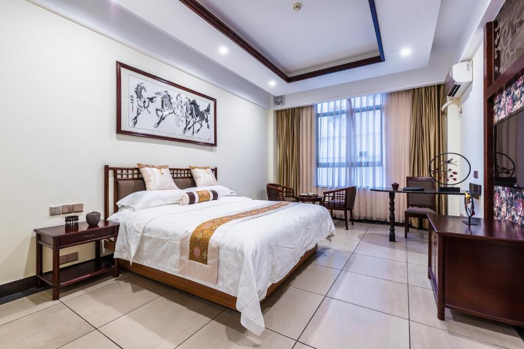 Двухместный (Двухместный номер Делюкс с 1 кроватью) отеля Hainan Jingshan Hotel, Хайкоу