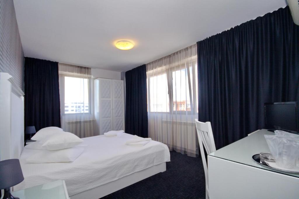 Двухместный (Улучшенный двухместный номер с 1 кроватью) отеля Hotel City, Тулча