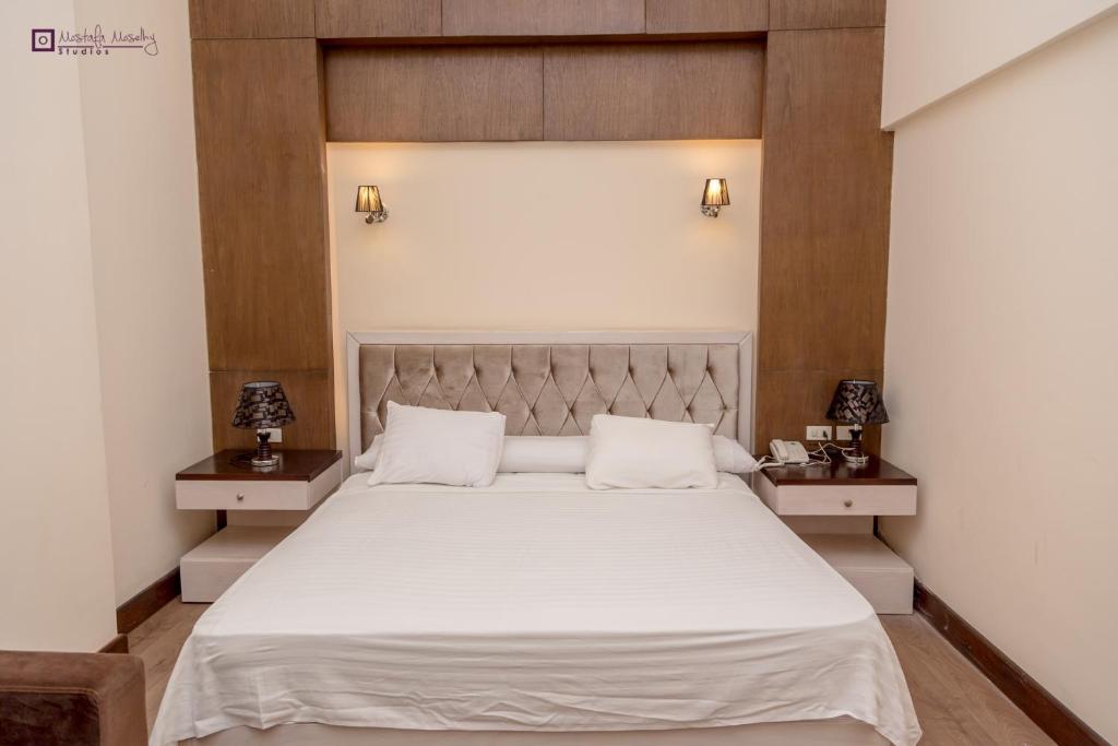Двухместный (Двухместный номер с 1 кроватью или 2 отдельными кроватями и видом на бассейн) отеля Ultra Loaloa Nile Maadi Hotel, Каир