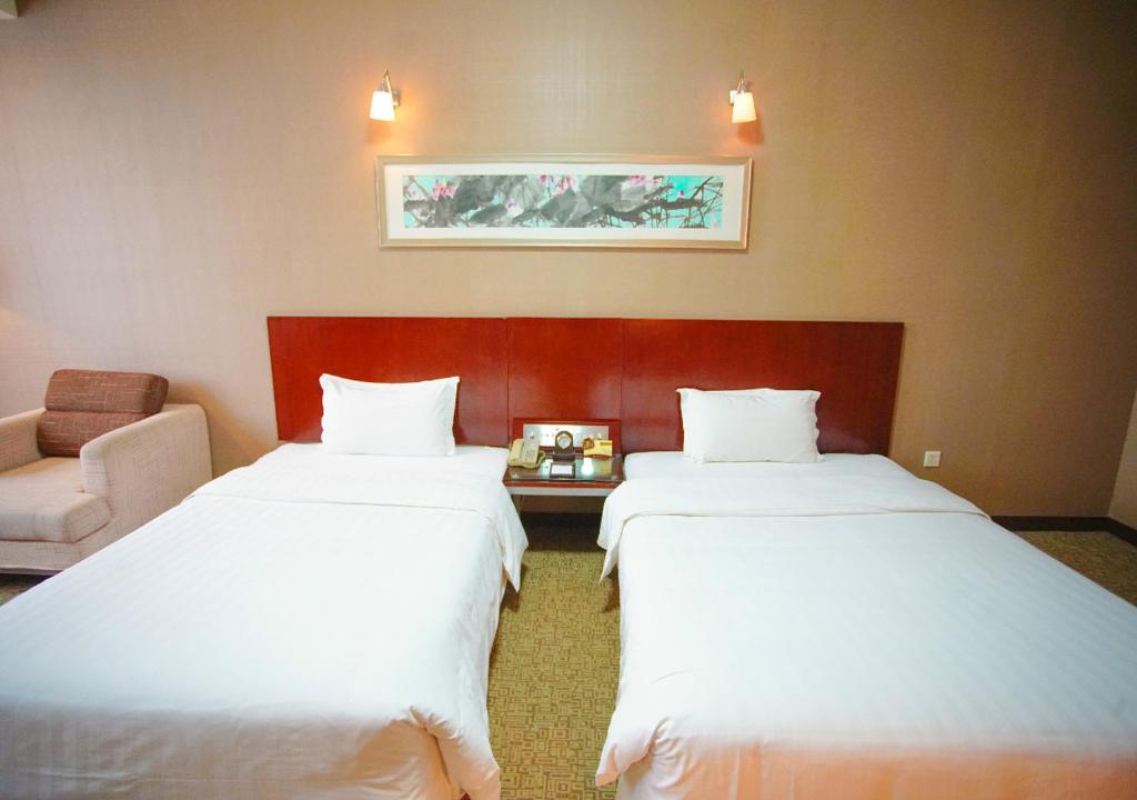 Двухместный (Двухместный номер эконом-класса с 2 отдельными кроватями) отеля Grand Soluxe Hotel Xi'an, Сиань