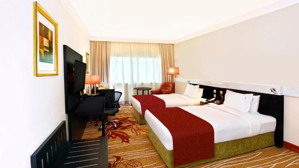 Двухместный (Представительский двухместный номер с 2 отдельными кроватями) отеля Holiday Inn Down Town, Дубай