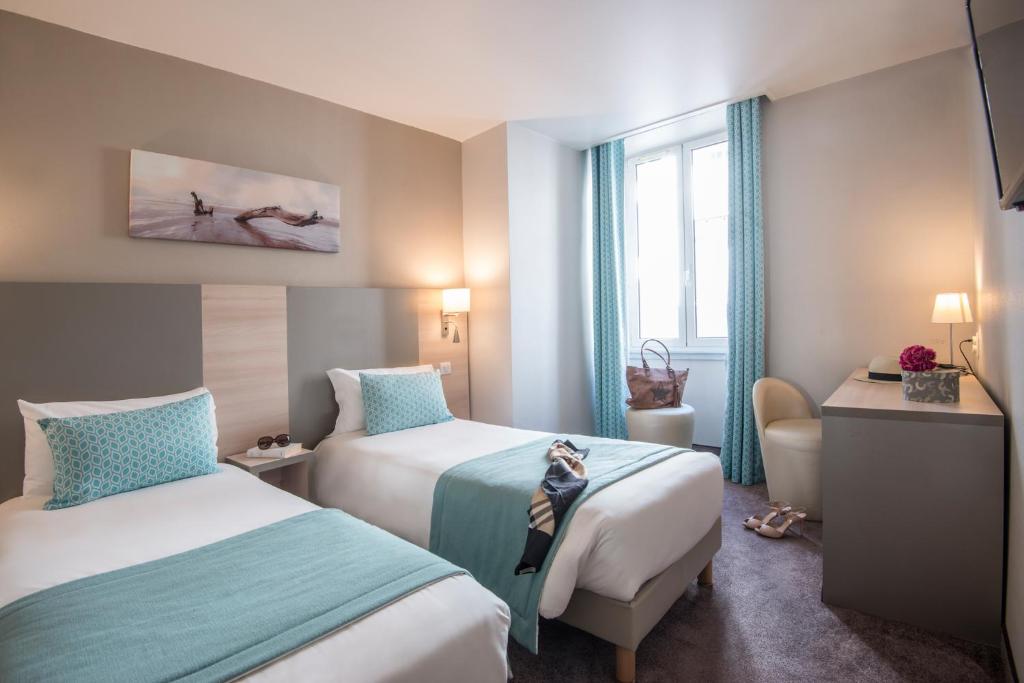 Двухместный (Двухместный номер с 2 отдельными кроватями) отеля Hotel Du Midi, Ницца